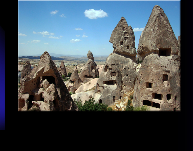 Fairy Chimneys in Tekelli Mahalle of Uchisar. Famous for the deserted Cave Houses and Pigeon Houses with Wall Paintings, an open Gallery of traditional Anatolian Art.