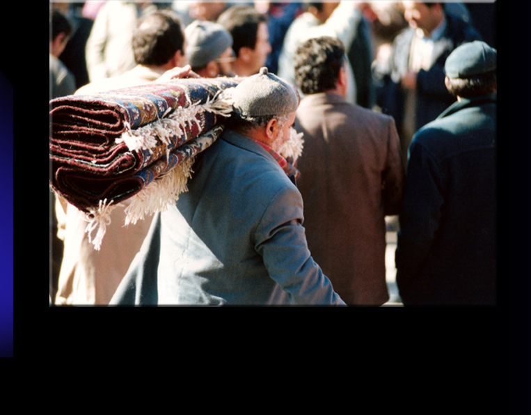 Man selling Carpet on weekly for handmade Carpets in Mountain Village Yahyali.