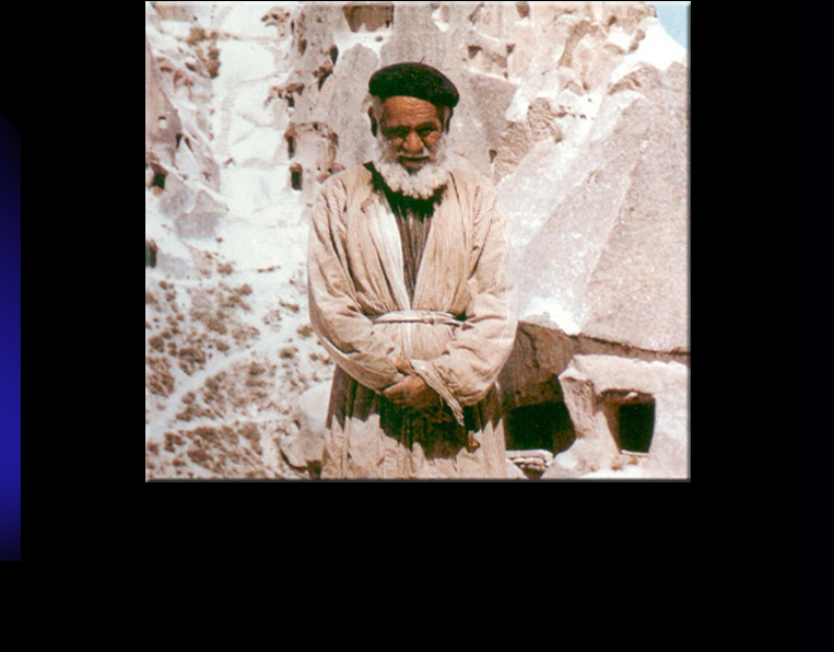 Cici Ahbap, born in 1902 in Yukari Mahalle of Uchisar, was known as the Clairvoyant of Uchisar. When he died in 1974 the villagers erected a mausoleum where he is buried in the centre of the graveyard outside the village. Photo taken appr. 1970