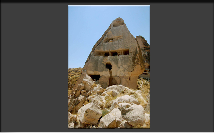Cappadocia Uchisar Village, former inhabited Fairy Chimney with Pigeon Houses