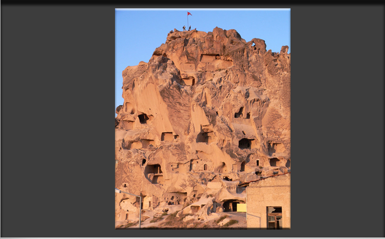 Cappadocia Uchisar Village, Castle with former inhabited Cave Apartments on different floors