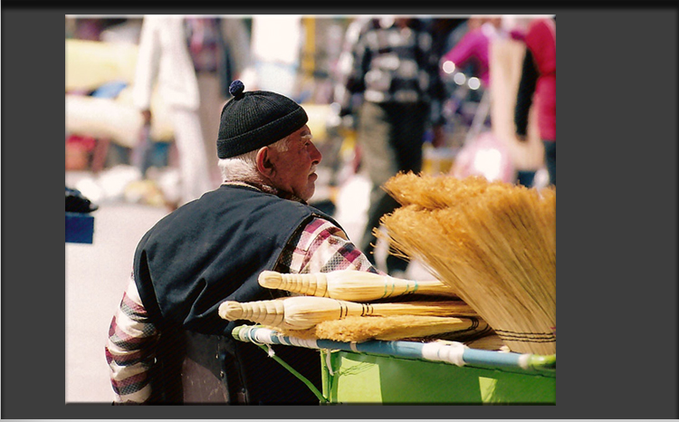 Cappadocia, Nevsehir Market, Man selling Brooms